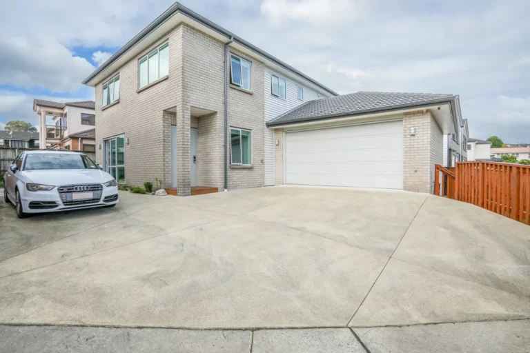 Driveway and double garage, Two brick homes, Ellerslie
