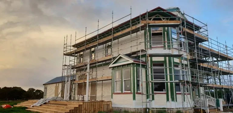 The villa in scaffolding during the renovation, The Huntly House, Clarks Beach
