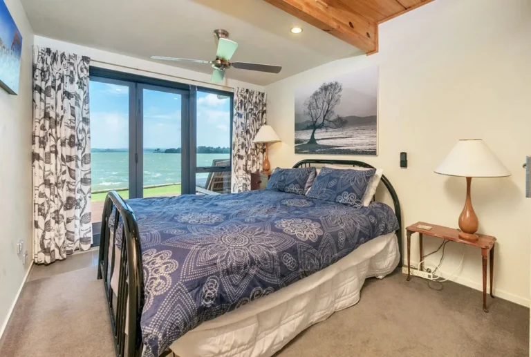 Bedroom looking out to the harbour, Waterfront home, Manukau Harbour
