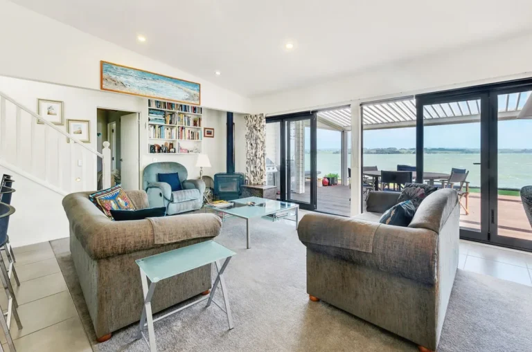 Lounge with harbour view, Waterfront home, Manukau Harbour