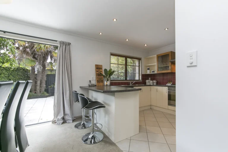 Kitchen and breakfast bar, Four bedroom home, Auckland